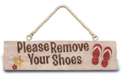 hanging sign - "please remove your shoes"